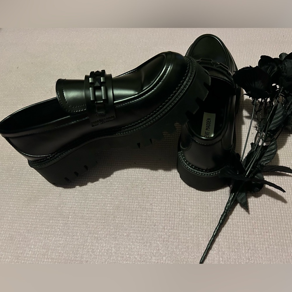 A pair of Steve Madden shoes.